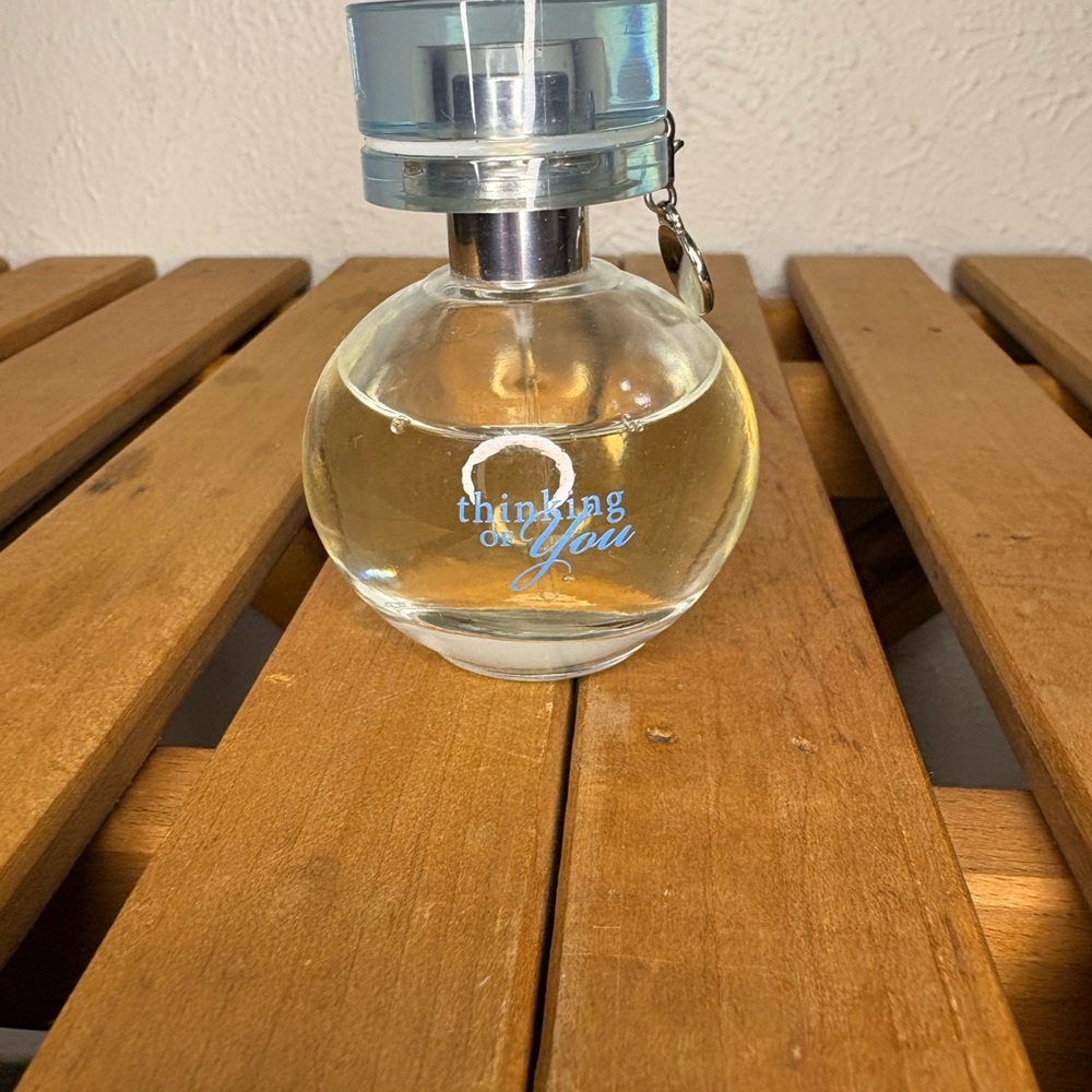Avon Thinking of You Perfume Bottle - Clear with Light Blue Cap